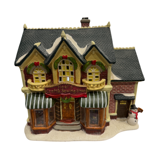 Holiday Inspirations - Noels Craft & Sewing Shop Christmas Village - 8"