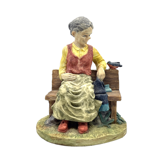 Vintage Figurine - Grandma On Bench With A Bird